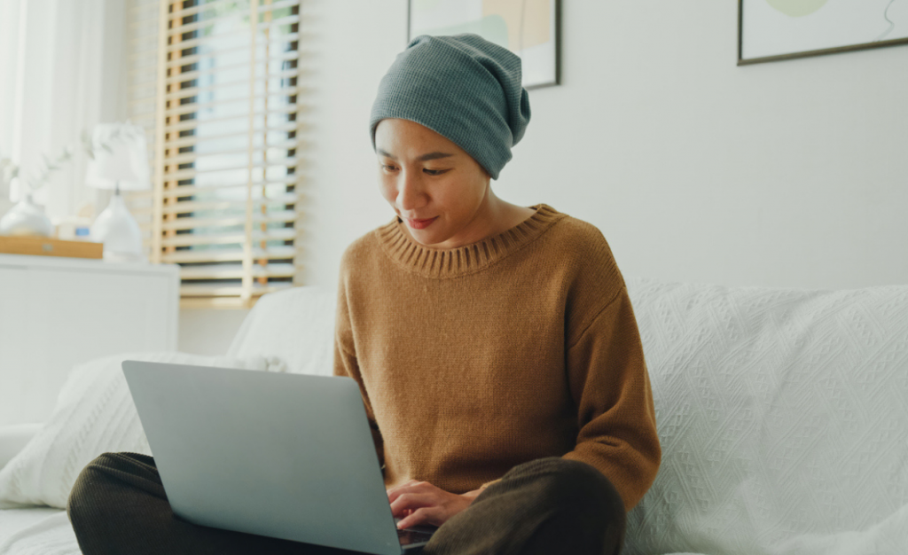 Person sitting on a couch deciding about whether or not to look at test results