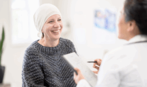 Woman meeting with her doctor to talk about the benefits of palliative care